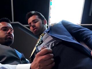 Suited Latino Gabriel Lunna dominates Dario Beck with a sizable cock, giving him a deep, intense anal breeding.